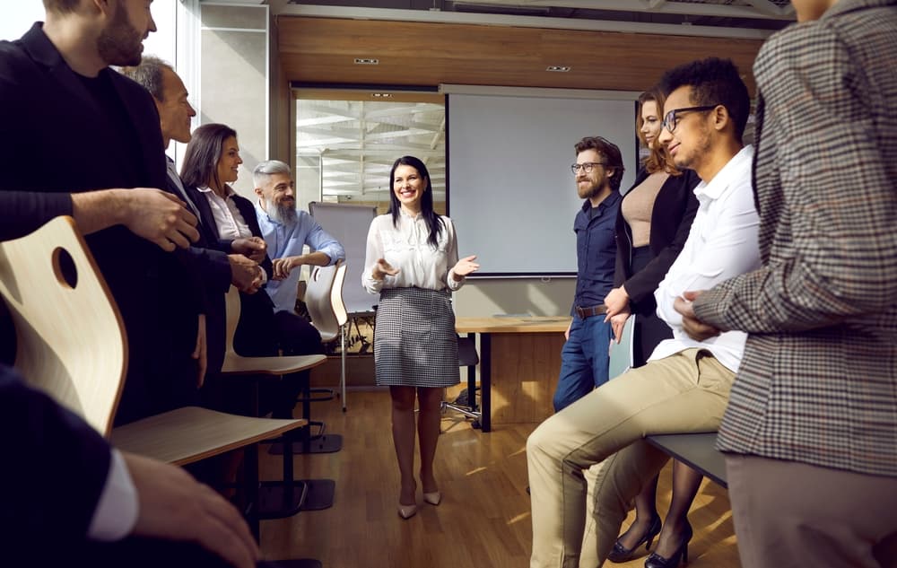 A workplace psychologist leads a team meeting