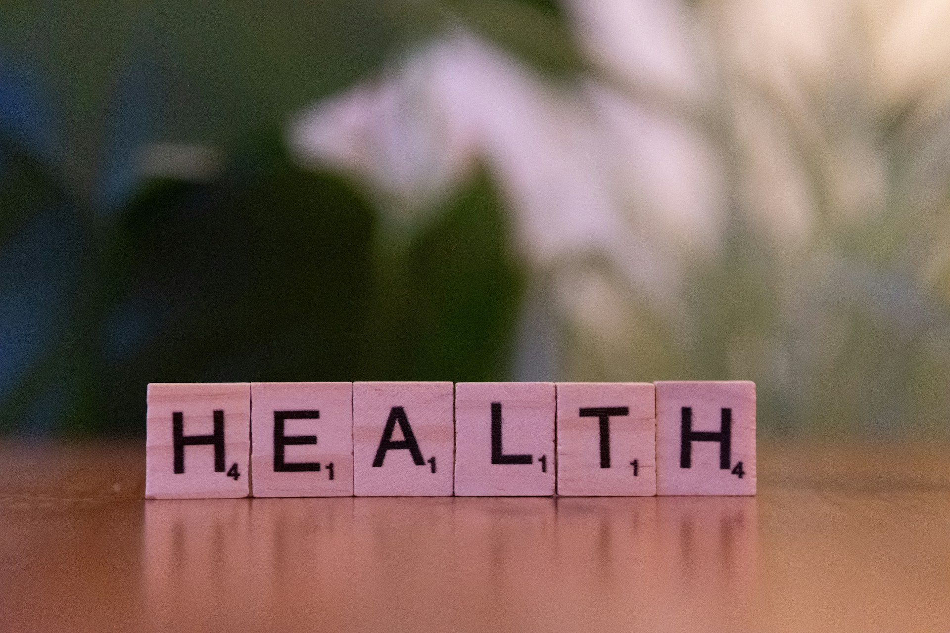 Six blocks spelling “HEALTH,” with one letter in each block
